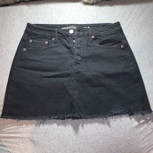 Black denim skirt